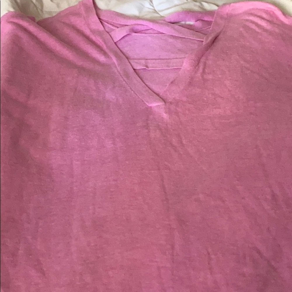 A pink v neck shirt so cute